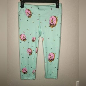Feed me fight me skull donut leggings